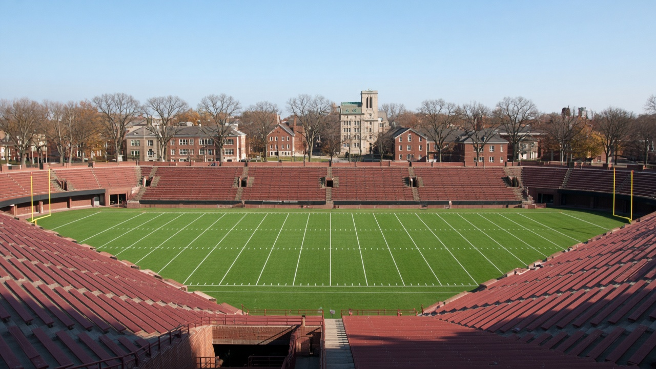 Empty brick college football stadium on an autumn day, no people